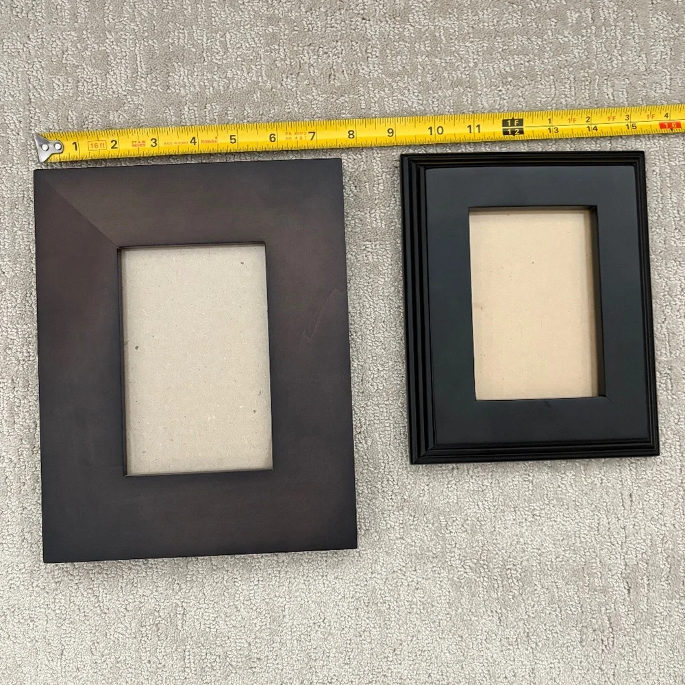 2 black frames, Crate & Barrel and unknown.